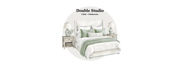 A white bed with green pillows and a green blanket is shown in the image.